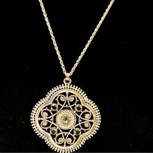 Metallic silver looking short chain with pendant